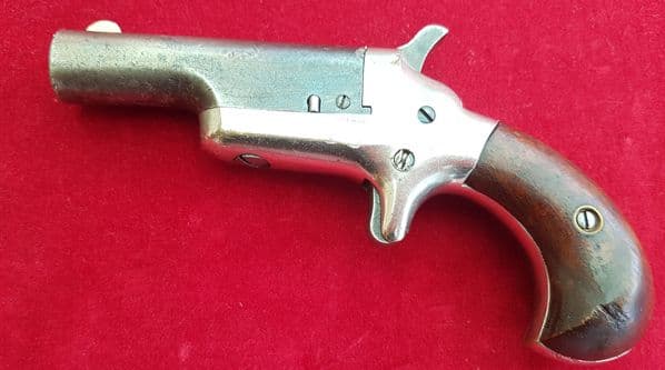 A scarce American Colt no 3.  rim-fire derringer in obsolete .41 rimfire calibre. C.1875. Ref 1579..